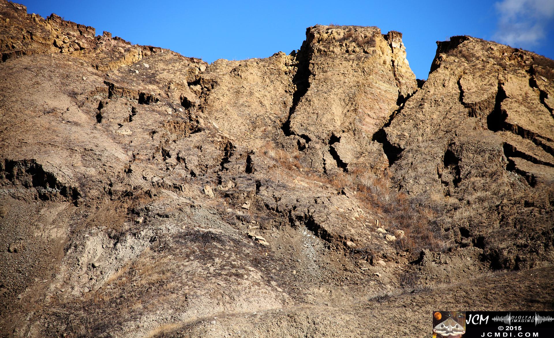 Landslide, buckled pavement, and terrain at Vasquez Canyon Road in Santa Clarita, CA filmed 11-25-2015